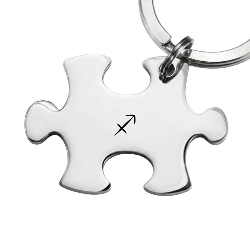 Porte-clé puzzle en acier gravé du symbole du Sagittaire