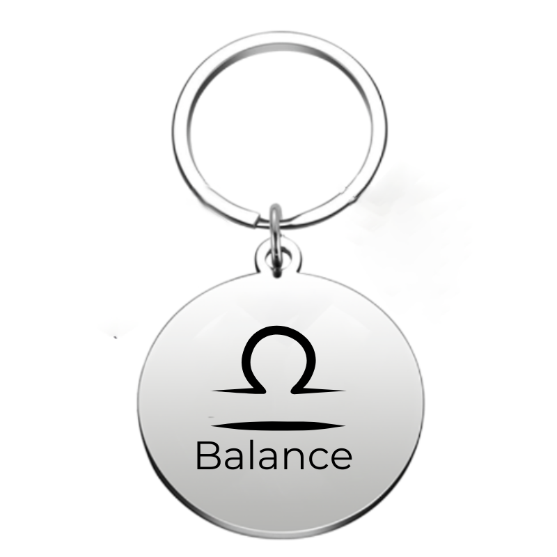 porte clé balance​

