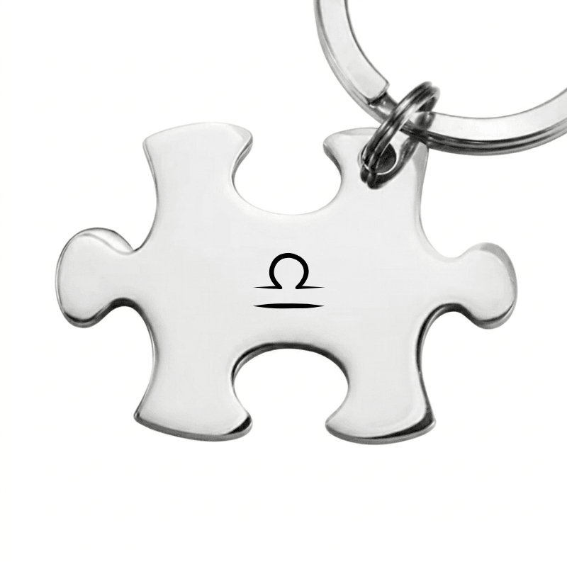 Porte-clé puzzle en acier gravé du symbole de la Balance