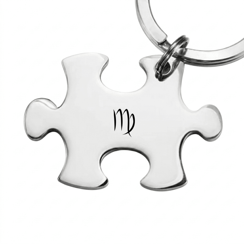 Porte-clé puzzle en acier gravé du symbole de la Vierge